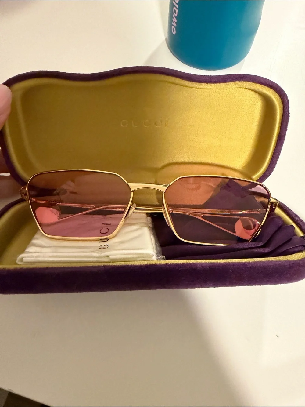 Gucci Gold Frame Sunglasses with Pink Lenses